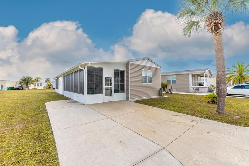 Photo of 7348 Swinton Ave, Port Charlotte, FL 33981 (MLS # C7518748)