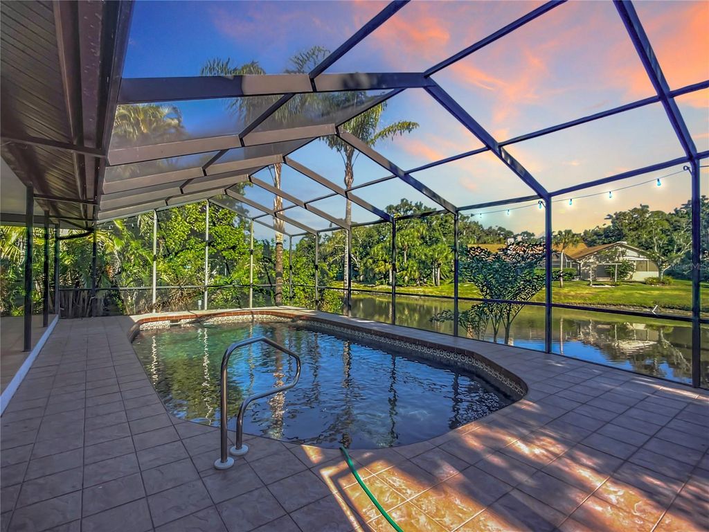 Photo of 4779 Maid Marian Lane, Sarasota, FL 34232 (MLS # A4672211)