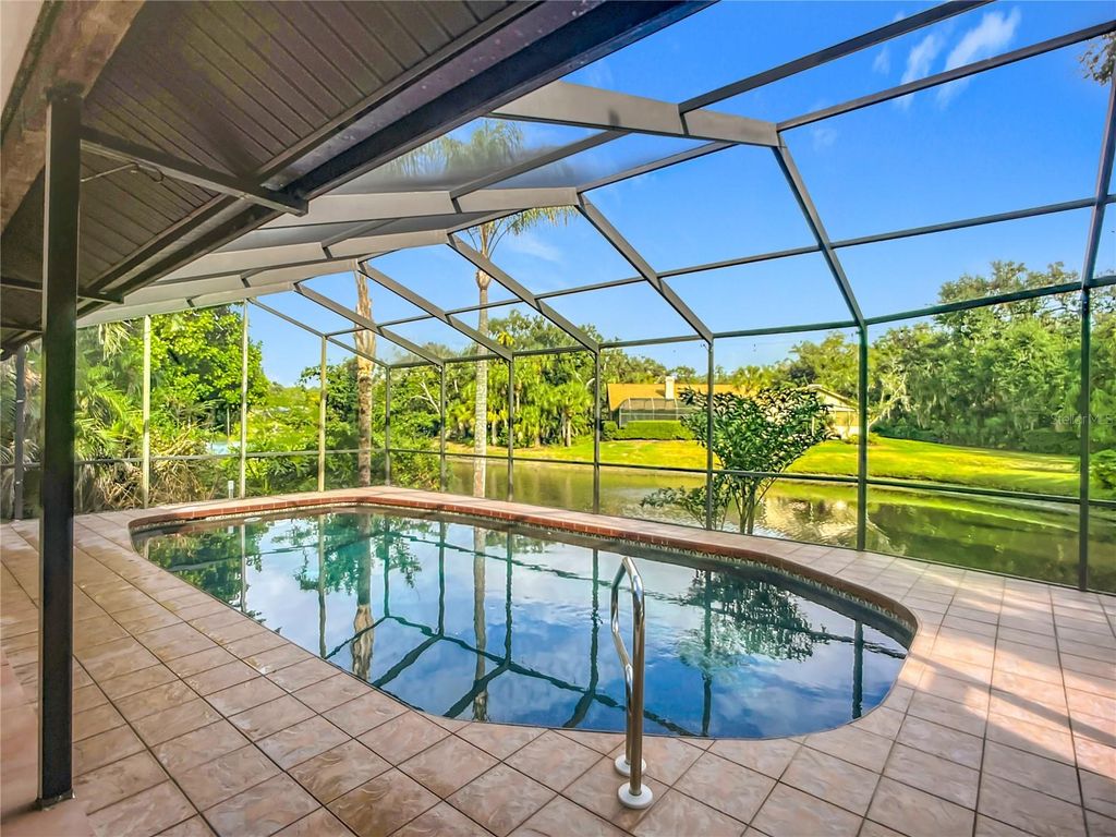 Photo of 4779 Maid Marian Lane, Sarasota, FL 34232 (MLS # A4672211)