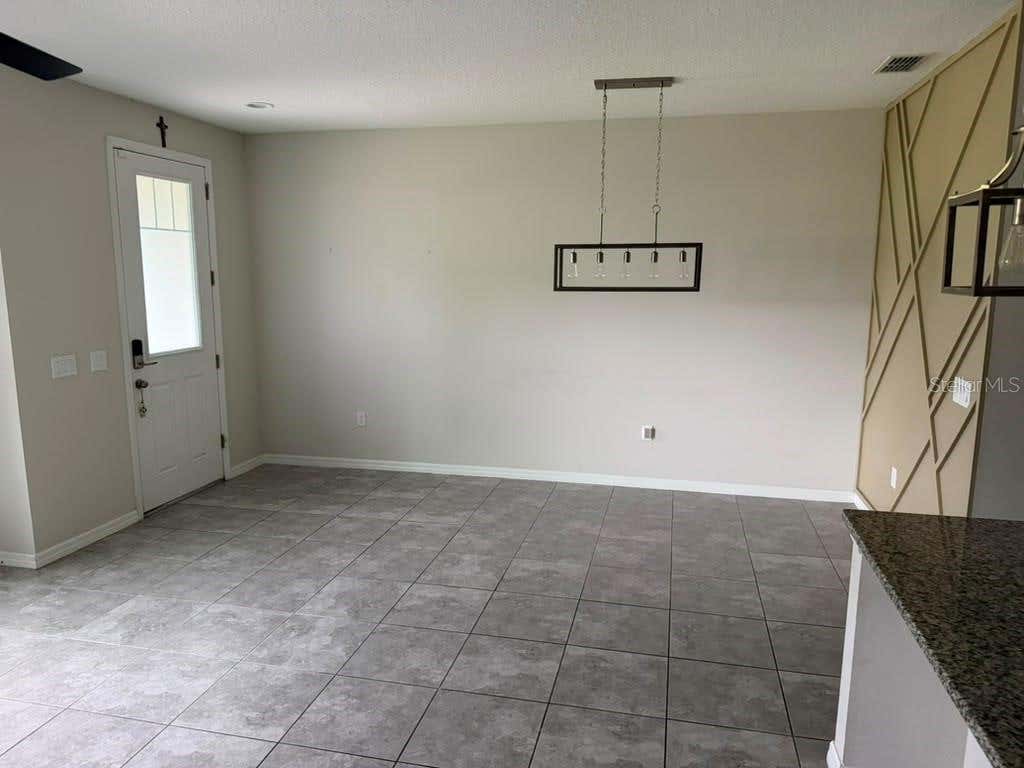 Photo of 2609 Play Hard Alley, Kissimmee, FL 34744 (MLS # S5153653)
