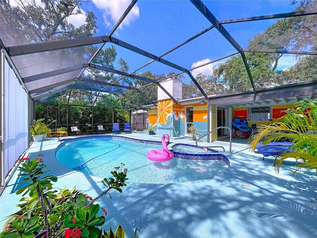 Photo of 12040 Riverhills Drive, Tampa, FL 33617 (MLS # TB8430861)