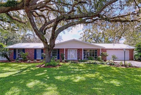 Photo of 12040 Riverhills Drive, Tampa, FL 33617 (MLS # TB8430861)
