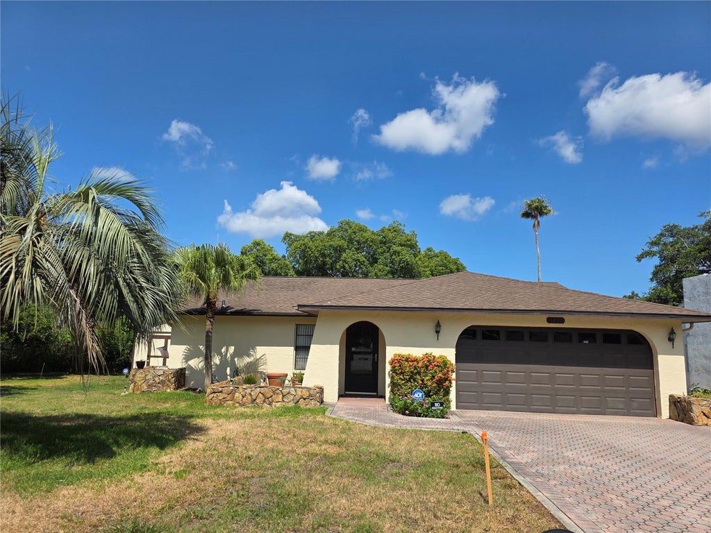 Photo of 8831 Forest Lake Drive, Port Richey, FL 34668 (MLS # W7887194)