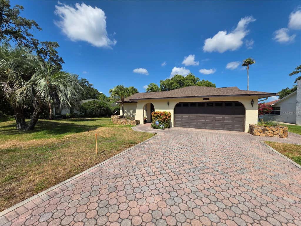 Photo of 8831 Forest Lake Drive, Port Richey, FL 34668 (MLS # W7887194)