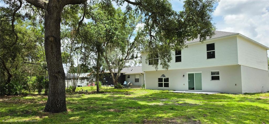 Photo of 2861 Blackburn Avenue, Deltona, FL 32738 (MLS # V4950260)