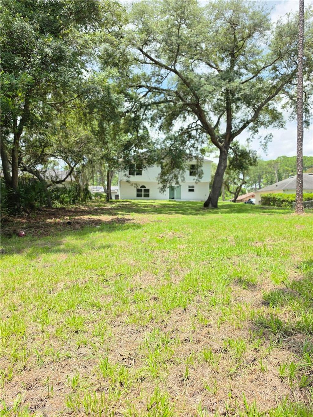 Photo of 2861 Blackburn Avenue, Deltona, FL 32738 (MLS # V4950260)
