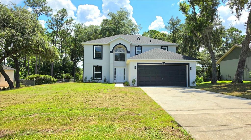 Photo of 2861 Blackburn Avenue, Deltona, FL 32738 (MLS # V4950260)