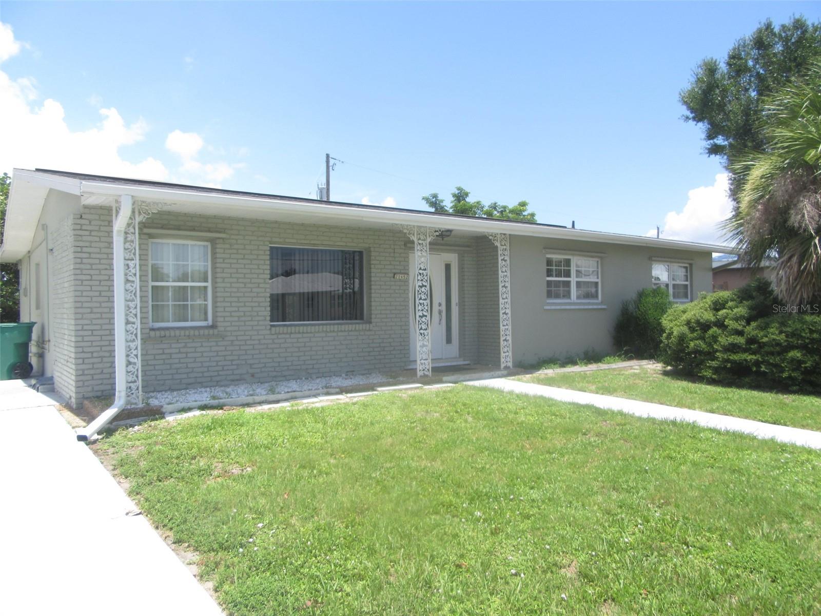 This impressive 3-bedroom 2 bath home has recently been remodeled and modernized. Be the first to live in over 1700 sq ft of comfortable living space. New overhead plumbing along with insta hot Tankless water heater. New Luxury Vinyl Plank flooring. New primary bathroom en-suite with Shaker style soft close wood cabinets, walk in shower with floor to ceiling tile and walk in cedar closet. New guest bath also has Shaker style soft close wood cabinet with tub shower combo. New roof in 2020. 2nd & 3rd bedrooms have plenty of room along with substantial closet space. Beautiful kitchen with wood cabinets and soft close drawers. An abundance of cabinets along with counter space makes this kitchen a great space to work in. Sizable pantry has pull out shelving. Corian counter tops and stainless-steel appliances. Kitchen opens to a massive bonus/family room area that is beautifully detailed with stained woodwork and trim that leads through the French doors to the patio in the backyard.