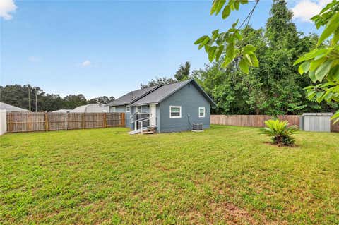 Tiny photo for 705 NW 64th Place, Ocala, FL 34475 (MLS # OM729621)