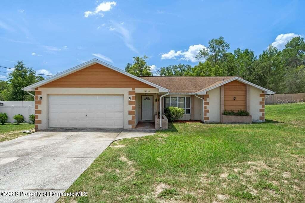 Photo of 11250 Homeway Street, Spring Hill, FL 34609 (MLS # J1005578)