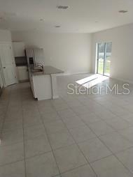 4 bedroom 2 bathroom, 1722 sq.ft., split floor plan, kitchen with center island, granite counter tops, stainless steel appliances, inside utility room w/ washer and dryer included, large master suite, master bathroom with dual vanities and standup shower, 9 foot ceiling thru-out, 2 car garage with opener. Community pool, playground and dog park.