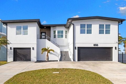 Photo of 850 Bay Point Drive, Madeira Beach, FL 33708 (MLS # TB8461842)