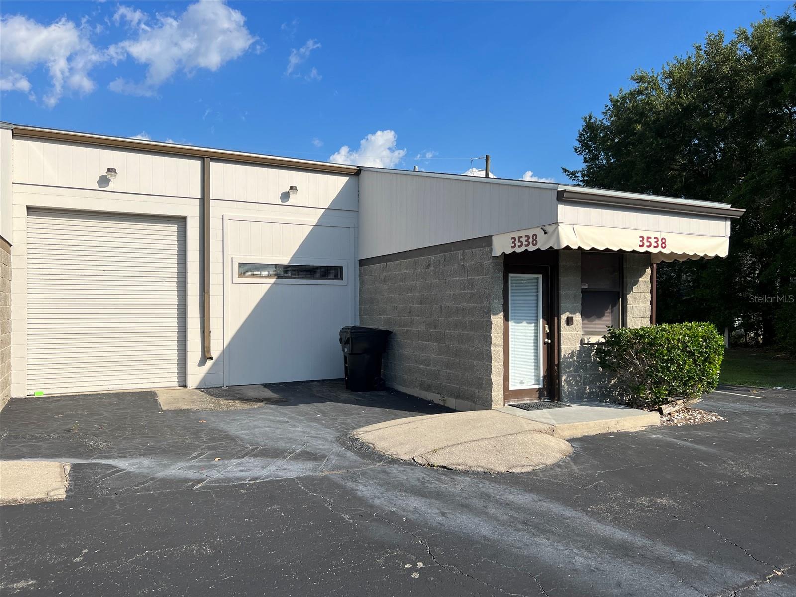 This well-maintained flex space is ideally positioned just off I-75 and NW 39th Avenue, offering excellent accessibility for a variety of business uses. The ±1,200 square foot unit includes five private offices, a reception area, a waiting room, and a kitchenette. Recently updated with fresh paint, new carpet, and a new HVAC system, the space is move-in ready. It also offers flexibility to be reconfigured into full warehouse space or customized to match your preferred office-to-warehouse ratio. A green space on the west side of the building can be fenced for outdoor storage, making it ideal for service companies, contractors, or logistics users requiring space for trailers, equipment, or work trucks.