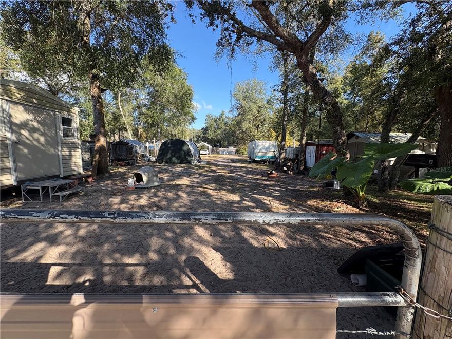 Motivated Seller! Welcome to Kerr Shores—where Lake Kerr sparkles, Salt Springs flows, and the fish practically volunteer to jump in your boat. Nearly a half-acre of old-Florida magic is up for grabs, and yes… it’s every bit as good as it sounds.

This lot already has the heavy lifting done: well, septic, and a couple of sheds ready for your rods, reels, and that tackle box you swear you organized last year. With voluntary access to the community clubhouse, boat ramp, dock, and wide-open recreation areas, you’ll be minutes from some of the best fishing and clearest freshwater in Florida.

Quiet? Absolutely. Beautiful? Of course. Likely to last long? Not a chance. Properties near Lake Kerr disappear faster than a bass on a mission.

Buyer and buyer’s agent to verify all information. Grab this slice of Salt Springs before someone else reels it in.