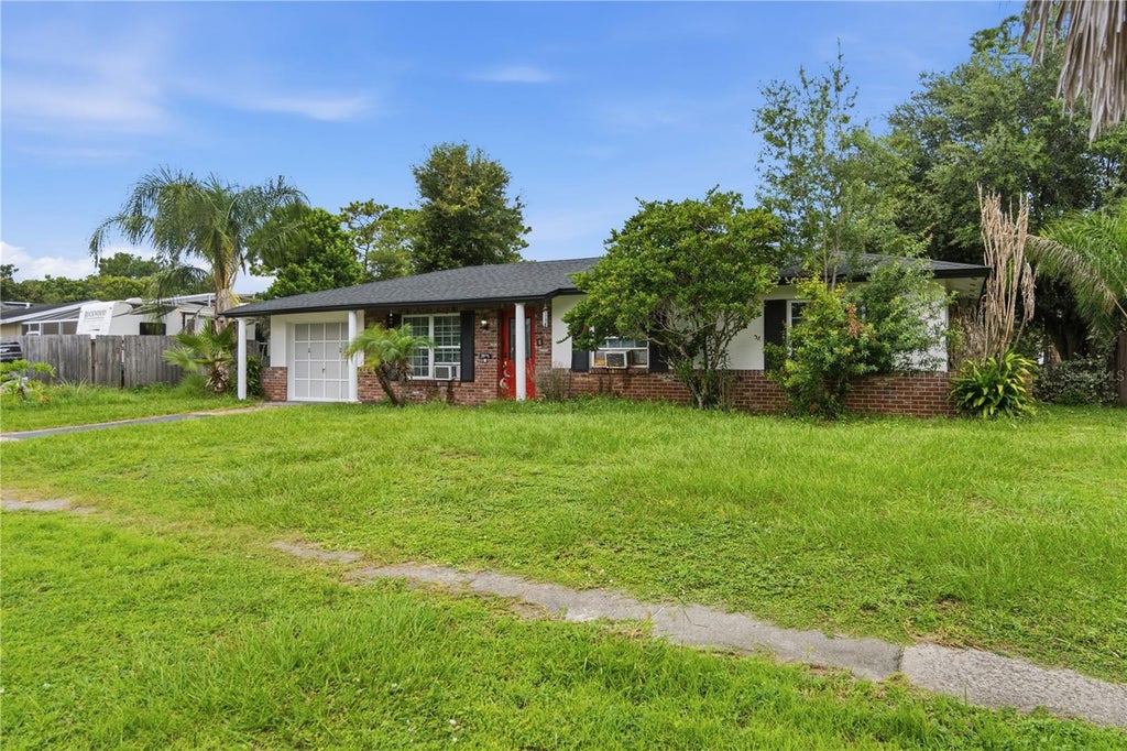 Photo of 7625 Gilchrist Drive, Orlando, FL 32822 (MLS # O6439414)