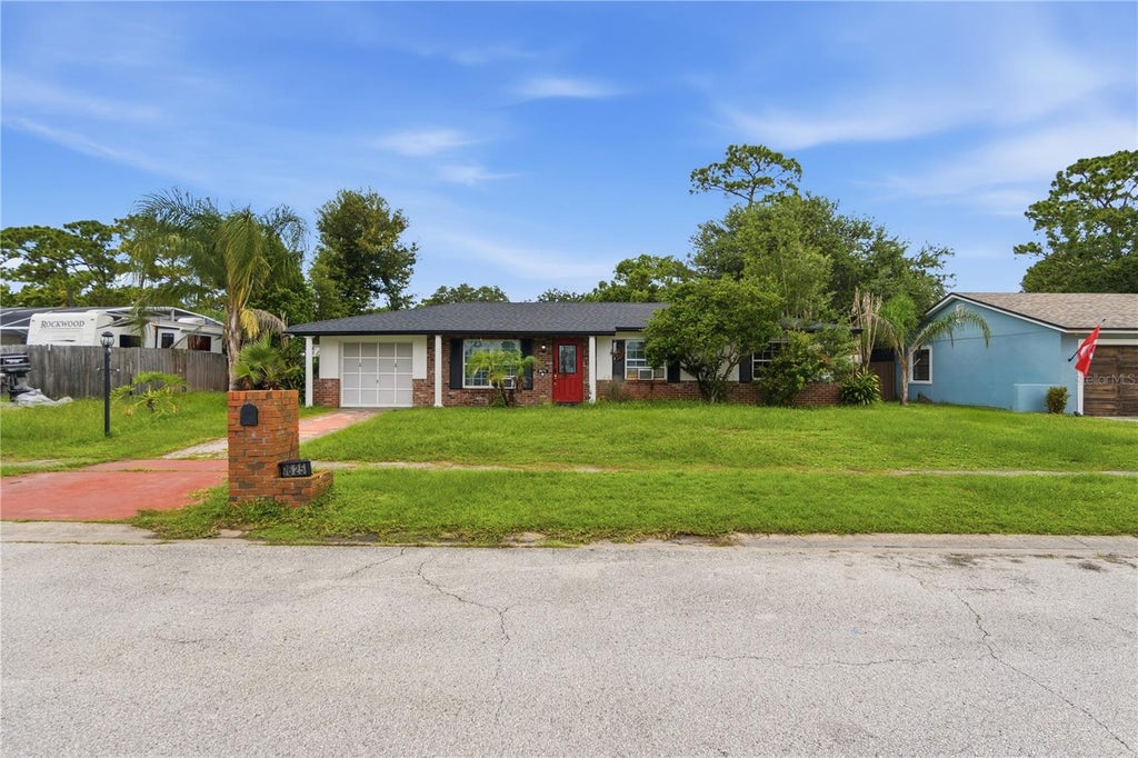 Photo of 7625 Gilchrist Drive, Orlando, FL 32822 (MLS # O6439414)