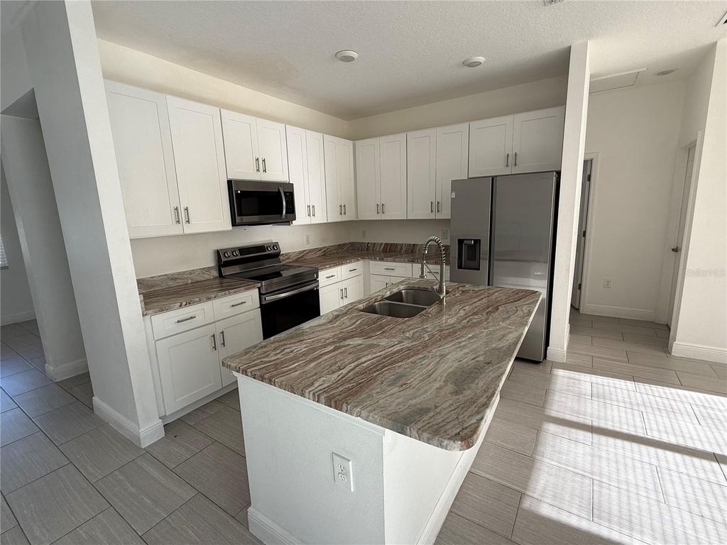 Photo of 734 Hudson Valley Drive, Kissimmee, FL 34759 (MLS # O6366262)