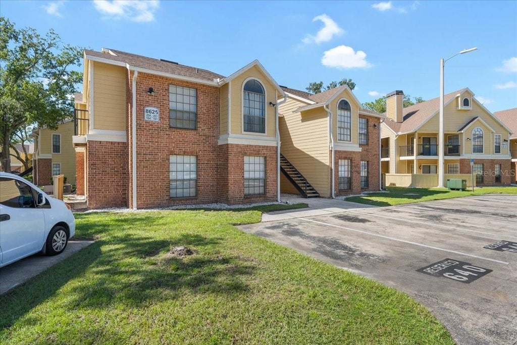 Photo of 8625 Fancy Finch Drive #102, Tampa, FL 33614 (MLS # TB8559093)