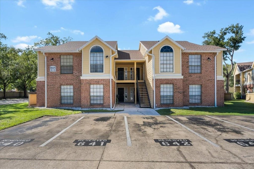 Photo of 8625 Fancy Finch Drive #102, Tampa, FL 33614 (MLS # TB8559093)