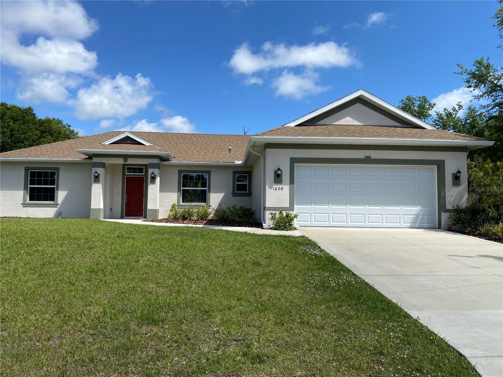IMPROVED PRICING! New Construction home. Move in ready. Open/split floor plan. Granite countertops and soft close cabinets and drawers. Kitchen has a breakfast island and plenty of cabinet and counter space. 9'4" ceilings. A laundry room with cabinets and a granite countertop convenient for folding laundry. The home has a combination of ceramic tile and carpet. This home features a spacious primary bedroom that is approximately 14x15
