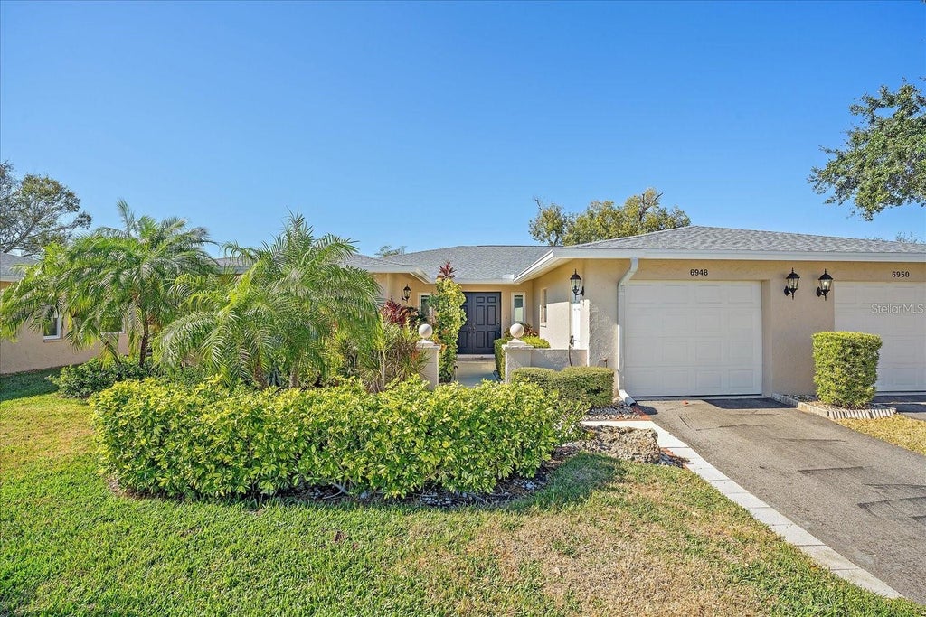 Photo of 6948 W Country Club Drive N #V-81, Sarasota, FL 34243 (MLS # A4704723)