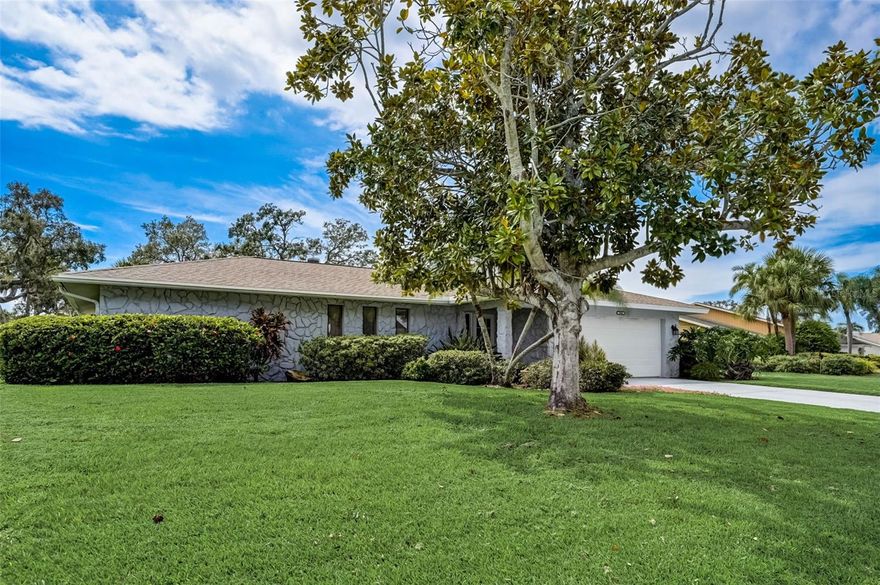 Remodel to your taste.  This home is now priced at lot value. Wonderful opportunity to live in this well maintained home and community of Country Club of Sarasota.  NEW ROOF 2006 one owner 20+years, has not been updated but carefully maintained.  True 3 bedroom 2 bath split plan home wood burning fireplace in the family room and a pool bath in the guest bedroom area. You will love the serene location of this home views multiple lakes and the Prestancia/TPC Golf and Country Club the two communities merge.  Prestancia is semi private country club and social and golf memberships are available. You can have your own golf cart and drive it to several golf courses in the area.  Minutes to Siesta Key beaches shopping and dining. Country Club of Sarasota has a private 24 hour guard at the gate only one entrance. Very low homeowner fees $1400 annually top notch security gates. Homeowners maintain their own properties. Great opportunity for a remodel or live in now build new later.