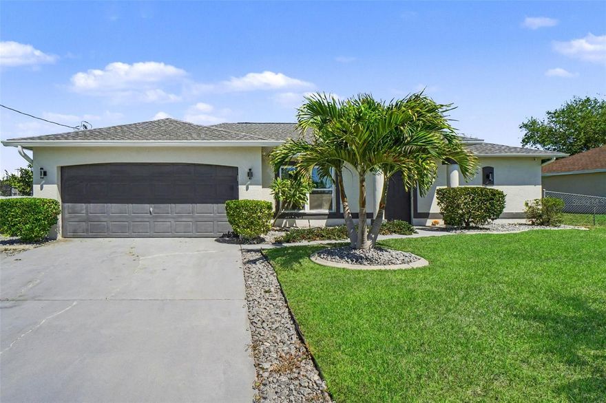 One or more photo(s) has been virtually staged. Move-in ready 3-bedroom, 2-bath home with a bonus room in beautiful neighborhood in SW Cape Coral. Updates include a 2022 roof, 2021 impact windows, quartz kitchen countertops, and refreshed bathrooms. Split floor plan with tile and laminate throughout. The bonus room works as a home office, playroom, or guest space — your call. Out back, a covered concrete patio opens to a large fenced yard with mature landscaping and room for a pool. Two-car attached garage and oversized driveway. ALL assessments paid! THIS PROPERTY QUALIFIES FOR A 1 percent LENDER INCENTIVE IF USING PREFERRED LENDER, INQUIRE FOR MORE DETAILS **  Great location, minutes from Pine Island Rd, all the new retail space and Seven Islands Project. Schedule your showing today! 1-YEAR HOME-TECH HOME WARRANTY INCLUDED!!