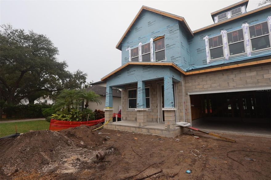 Under Construction. Welcome to the Taylorcrest by David Weekley Homes—South Tampa’s newest gem.
Centrally located in the heart of South Tampa, this brand-new home combines timeless curb appeal with modern luxury, crafted by an award-winning builder known for exceptional quality. Nestled on a deep 131-foot homesite along a street lined with other new construction, the property provides ample space and endless potential for outdoor living and entertaining.
Inside, the thoughtfully designed floor plan balances style with functionality. The first-floor primary suite—a rare feature in today’s new homes—offers a spa-inspired retreat complete with a walk-in super shower and abundant natural light. Also on the main level, you’ll find a private front-facing study and an expansive open-concept great room. Sliding glass doors blur the line between indoors and out, creating seamless flow for gatherings.
At the heart of the home, the gourmet kitchen shines with ceiling-height cabinetry, quartz countertops, a wood-wrapped island, and premium KitchenAid appliances—including a gas cooktop, counter-depth refrigerator, and wine reserve. Designer touches such as an elegant wood exhaust hood, 8-foot solid core doors, and impact-rated glass elevate every detail.
Upstairs, there’s room for everyone with four spacious bedrooms (two with ensuite baths), a dedicated media room, and a generous bonus room ideal for game days, hobbies, or relaxed evenings in.
Backed by David Weekley’s reputation for craftsmanship and service, this home is more than just a place to live—it’s a lifestyle to love.