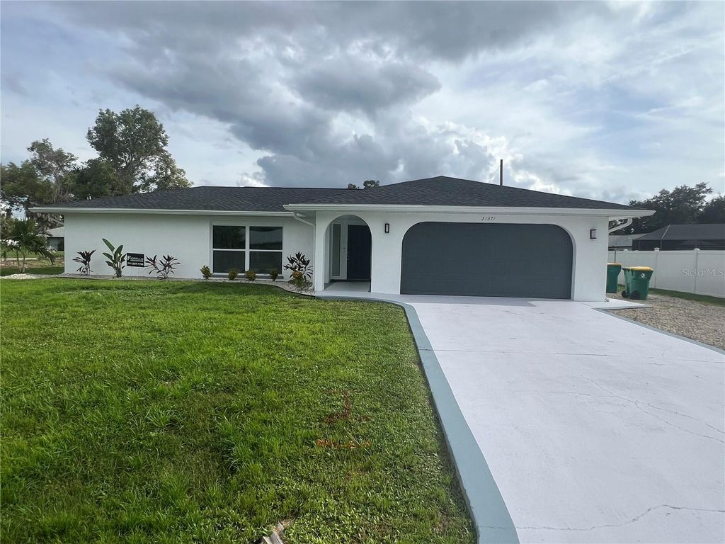 Photo of 21371 Knollwood Avenue, Port Charlotte, FL 33952 (MLS # C7514243)