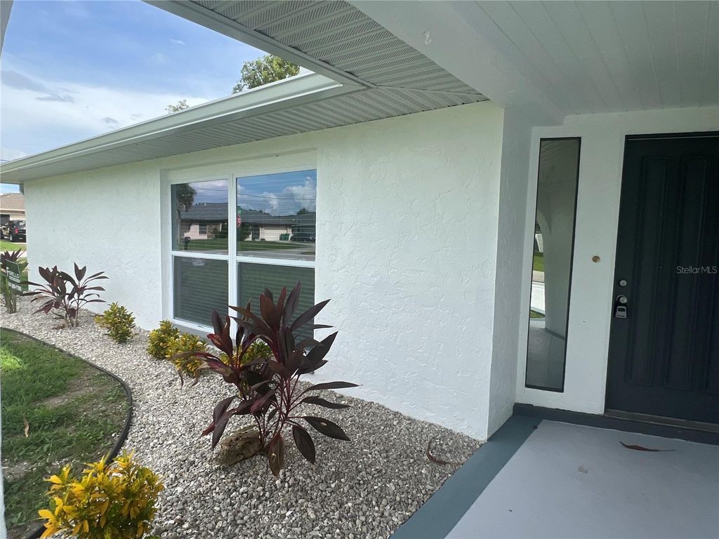 Photo of 21371 Knollwood Avenue, Port Charlotte, FL 33952 (MLS # C7514243)