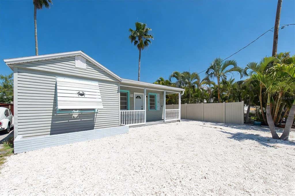 Photo of 358 Boca Ciega Drive, Madeira Beach, FL 33708 (MLS # TB8476937)