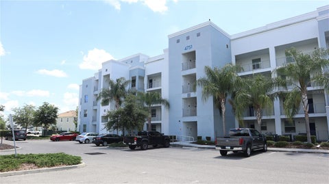 Photo of 4751 Clock Tower Drive #305, Kissimmee, FL 34746 (MLS # O6410323)