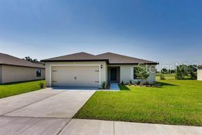 Priced to Sell – A Great Opportunity to Add Your Personal Touch! Don’t miss this fantastic chance to own a well-designed home in the desirable Ridge at Swan Lake community in the Orlando area. This spacious single-story Bokeelia floor plan by LGI Homes offers excellent potential and is priced to sell quickly. While it may need a bit of TLC, it’s a solid home in a thriving location—ready for your updates and personal style. Featuring an open-concept layout, this home includes 3 bedrooms and 2 full bathrooms, complete with: Energy-efficient appliances, water Softener, Granite countertops, Custom wood cabinetry, Brushed nickel hardware, An attached 2-car garage. The private primary suite boasts a massive walk-in closet, and the home includes a dedicated utility room, a covered back patio, and fully landscaped front yard with an irrigation system. Set within the peaceful, nature-filled Ridge at Swan Lake community, you’ll enjoy scenic views, tranquil lakes, walking and biking trails, and a welcoming neighborhood atmosphere. Plus, you're just minutes from Disney World, LEGOLAND, fine dining, shopping, and entertainment. This is the perfect home for someone looking for value, location, and a bit of vision. Schedule your showing today and see the potential for yourself!
