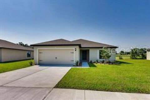 Photo of 1733 Canaan Loop, Dundee, FL 33838 (MLS # O6332242) Photo of 1733 Canaan Loop, Dundee, FL 33838 (MLS # O6332242)