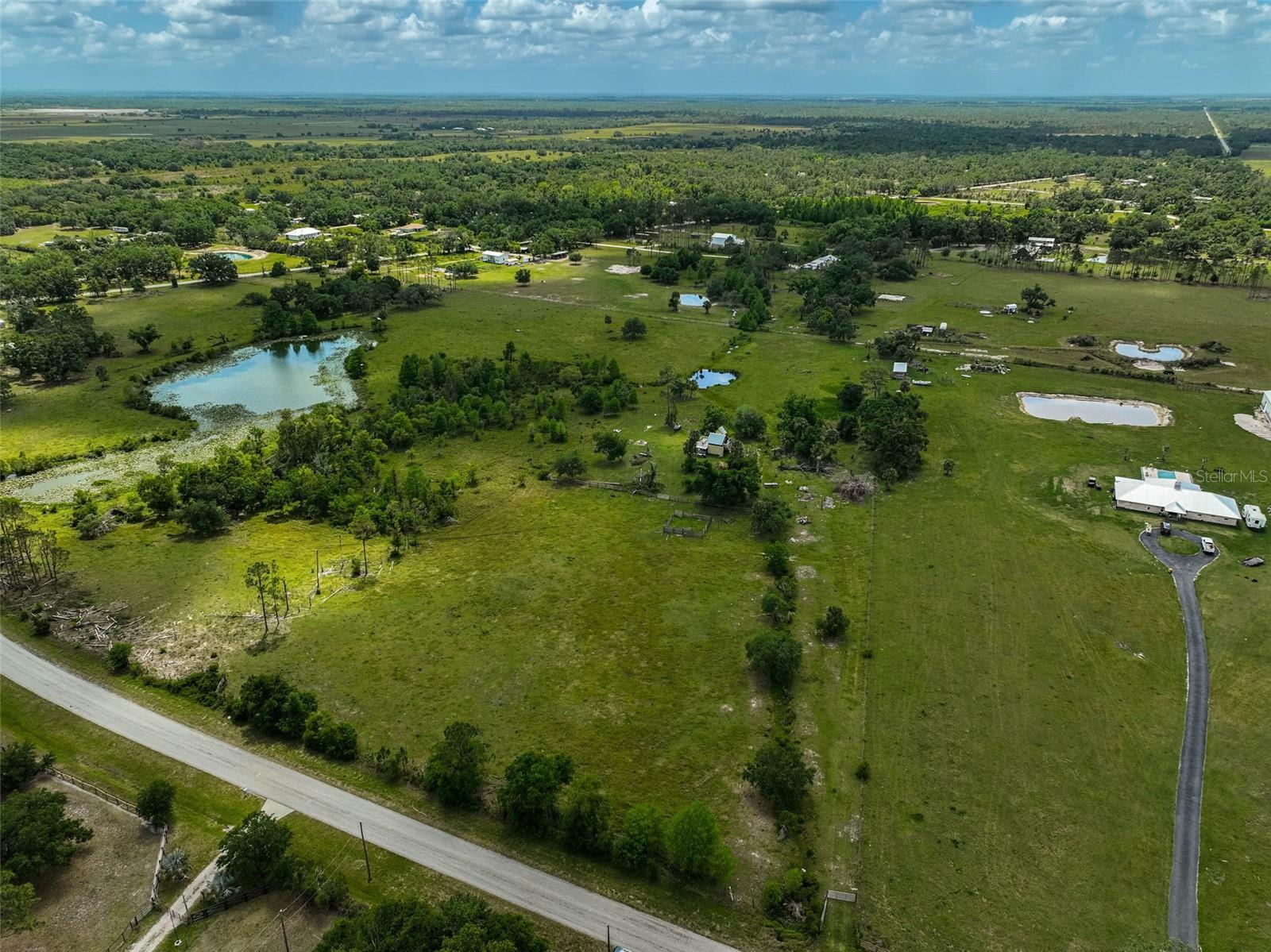 Are you ready to embrace the beauty of wide-open spaces and idyllic country living? This stunning 10-acre parcel of land is your canvas for creating the life you've always dreamed of! Imagine a serene pond that sparkles at sunset, offering the perfect blend of charm and endless potential. This fully fenced property is ideal for livestock and includes a spacious pole barn that’s perfect for your hobbies. Whether you envision building your custom dream home, starting a self-sufficient homestead, or simply seeking a tranquil getaway, this property has it all. With no HOA restrictions, you have the freedom to choose your own builder and take your time designing your perfect lifestyle. Relish in breathtaking sunrises and sunsets while exploring a myriad of possibilities! Plus, the mineral rights are included with this property! Could this land be the perfect match for you? Don't wait—book your showing today and start your journey to country living!
