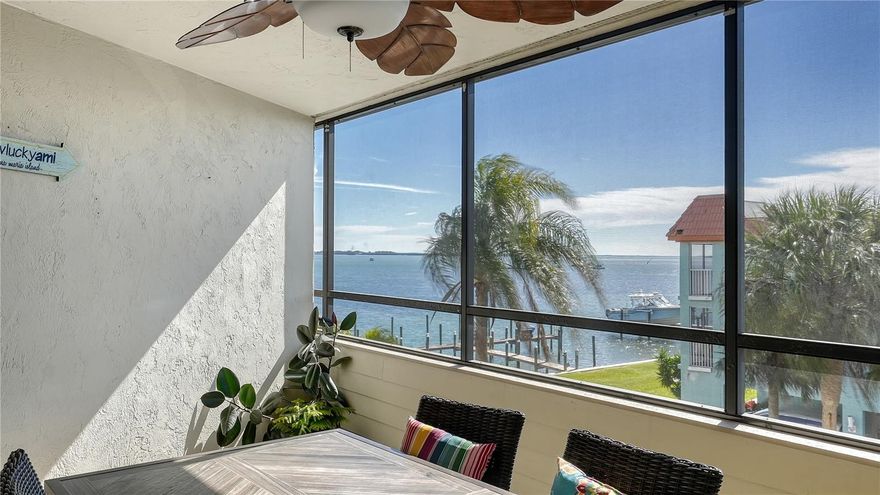 An unparalleled Anna Maria Island lifestyle — and a compelling investment opportunity — await in this beautifully updated top-floor, end-unit condo at Bayview of Bradenton Beach. Enjoy tranquil Sarasota Bay views with your morning coffee and glowing sunsets to close the day — the kind of scenery that consistently drives strong rental demand. This 2-bedroom, 2-bath residence has been thoughtfully refreshed and is offered turnkey allowing for immediate personal use or continued vacation rental operation. Recent improvements include new luxury vinyl plank flooring throughout, along with community upgrades such as a newly fenced pool area, enhanced dock lighting, a freshly repaved driveway, and a brand-new roof completed in 2025. The open-concept kitchen is designed for entertainment, featuring granite countertops, stainless steel appliances and a peninsula with bar seating that flows seamlessly into the living and dining areas. The spacious great room provides flexible living space with the potential to incorporate a Murphy bed, allowing for increased sleeping accommodations and enhanced rental versatility. The primary suite offers water views from its private lanai, dual vanities with stone tops, a walk-in shower and ample built-in closet space. The guest bedroom provides excellent versatility with a Murphy bed — ideal for maximizing sleeping capacity, creating a home office or accommodating longer-term guests. A newer full-size stackable washer and dryer add everyday convenience for owners and renters alike.  Owners and guests enjoy two assigned parking spaces, private and shared storage, a large community pool, and direct intercoastal access via the community dock, supporting boating, paddleboarding and water-sport lifestyles that enhance rental desirability. Additional building improvements include a secure, modernized elevator, further supporting long-term value.  Beach access is effortless with a quick walk across the street to the sugar-soft sands of the Gulf of Mexico, while the restaurants, shops, nightlife and city pier along Bridge Street are just steps away — a location that consistently attracts repeat vacationers.
Whether you’re seeking a refined island retreat, a turnkey vacation rental, or a strategic 1031 exchange replacement property, this residence delivers the rare combination of bay views, Gulf proximity, boating access, walkability and proven island appeal.