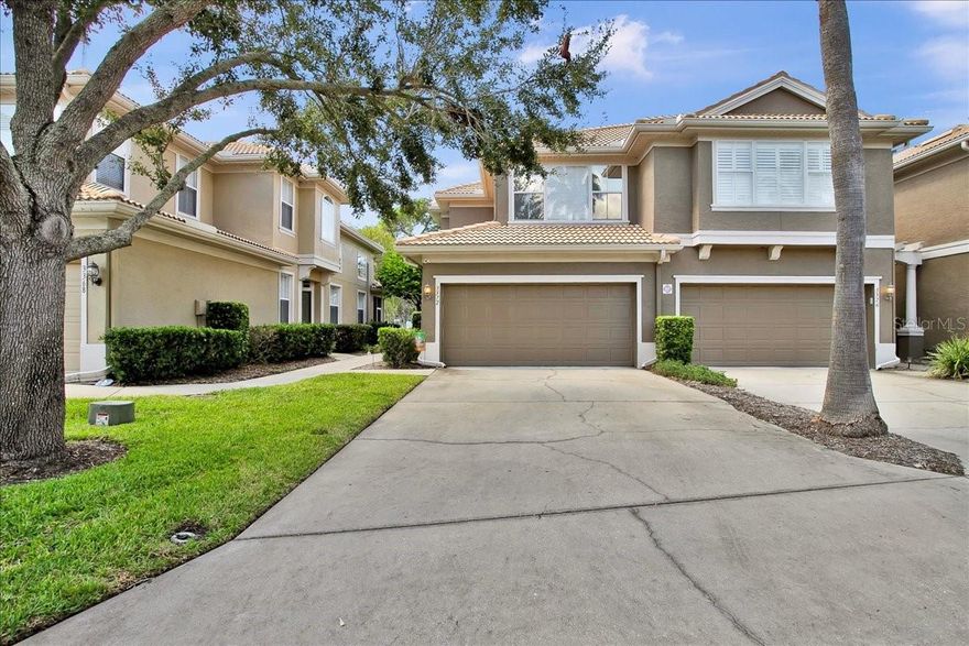 Welcome to this stunning end-unit townhome in the highly sought-after gated community of Covered Bridge in Dunedin!
Featuring 3 spacious bedrooms, 2.5 bathrooms, and a 2-car garage, this beautifully maintained residence blends comfort, convenience, and style in one of Dunedin’s most desirable locations.
Step inside to discover gorgeous wood flooring throughout the expansive great room, bathed in natural light thanks to large windows and an open-concept layout. The modern kitchen offers stainless steel appliances, abundant cabinetry, a cozy breakfast nook, and an adjacent laundry room with extra storage.
Soaring ceilings in the great room add a sense of space and grandeur, while sliding glass doors lead to a screened-in patio overlooking serene, lush greenery. 
The primary suite, located on the first floor, features private patio access, a large walk-in closet plus an additional reach-in closet, and a spa-like ensuite bathroom complete with double sinks, a soaking tub, and a frameless walk-in shower.
Upstairs, a spacious loft offers versatility for a home office, game room, or media retreat. Two generously sized bedrooms and a full bath complete the upper level.
Recent updates include:
• HVAC (2018)
• Washer, dryer, and garbage disposal (2025)
Covered Bridge is not in a flood zone, does not require flood insurance, and the property has no flooding history. Covered Bridge is known for its peaceful, park-like setting and excellent amenities, including a community pool, gated entry, and HOA coverage for the roof, exterior maintenance, exterior paint, and landscaping. 
Enjoy a prime location just minutes from Downtown Dunedin, the Pinellas Trail, Honeymoon Island, and the Dunedin Causeway—offering easy access to shopping, dining, and Florida’s stunning natural beauty.
Don’t miss this exceptional opportunity to own a low-maintenance home in one of Dunedin’s most beloved communities!