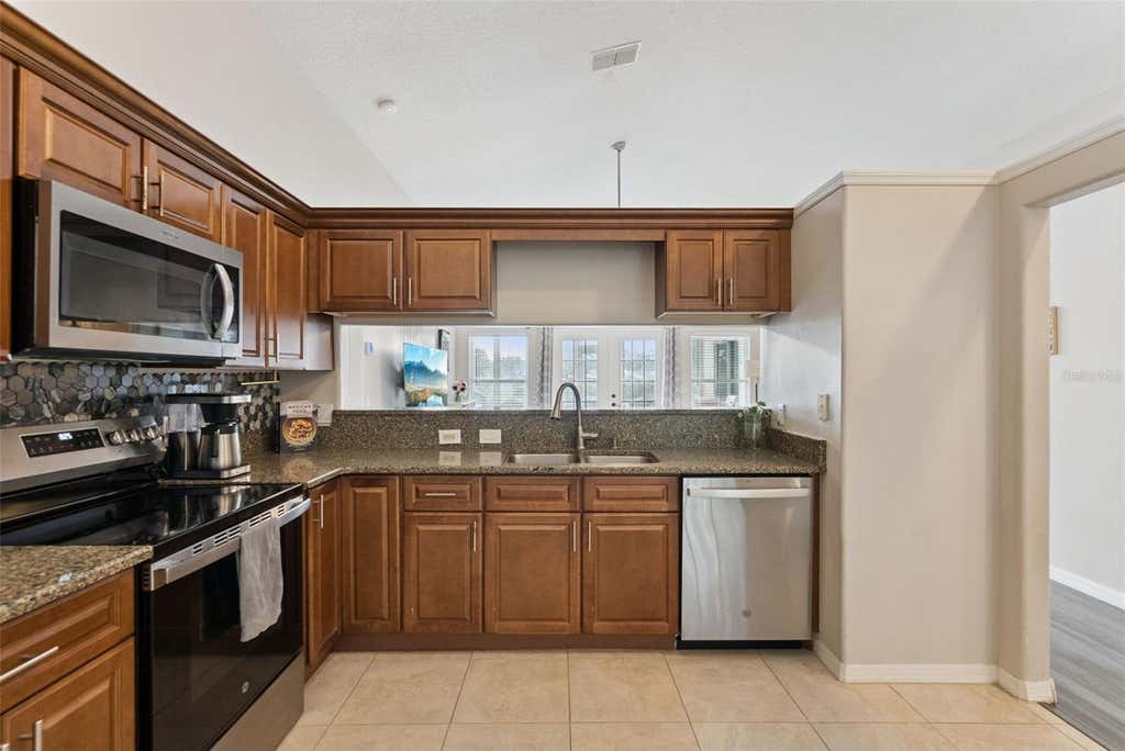 Photo of 833 Delfino Place, Lake Mary, FL 32746 (MLS # V4950869)