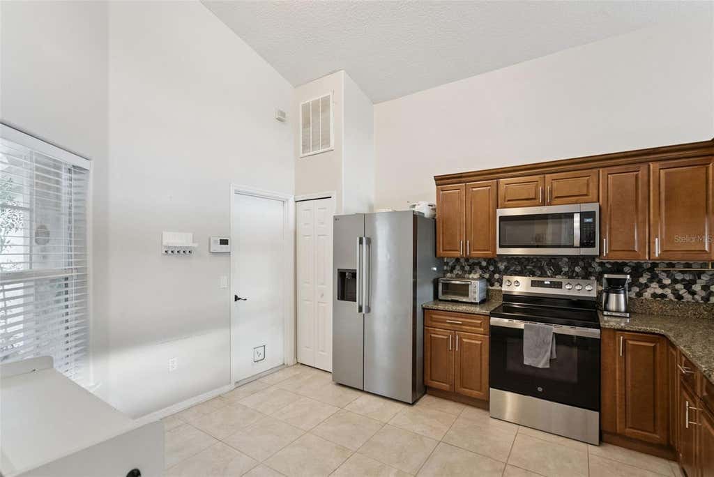 Photo of 833 Delfino Place, Lake Mary, FL 32746 (MLS # V4950869)