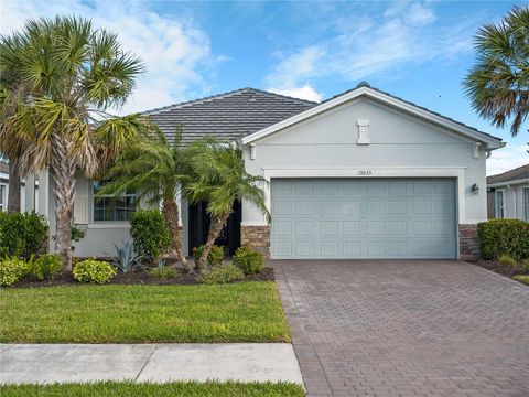 Photo of 15033 Spanish Point Drive, Port Charlotte, FL 33981 (MLS # C7519520)