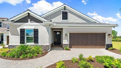 Photo of 1797 Trailhead Lane, Zephyrhills, FL 33541 (MLS # TB8367242)