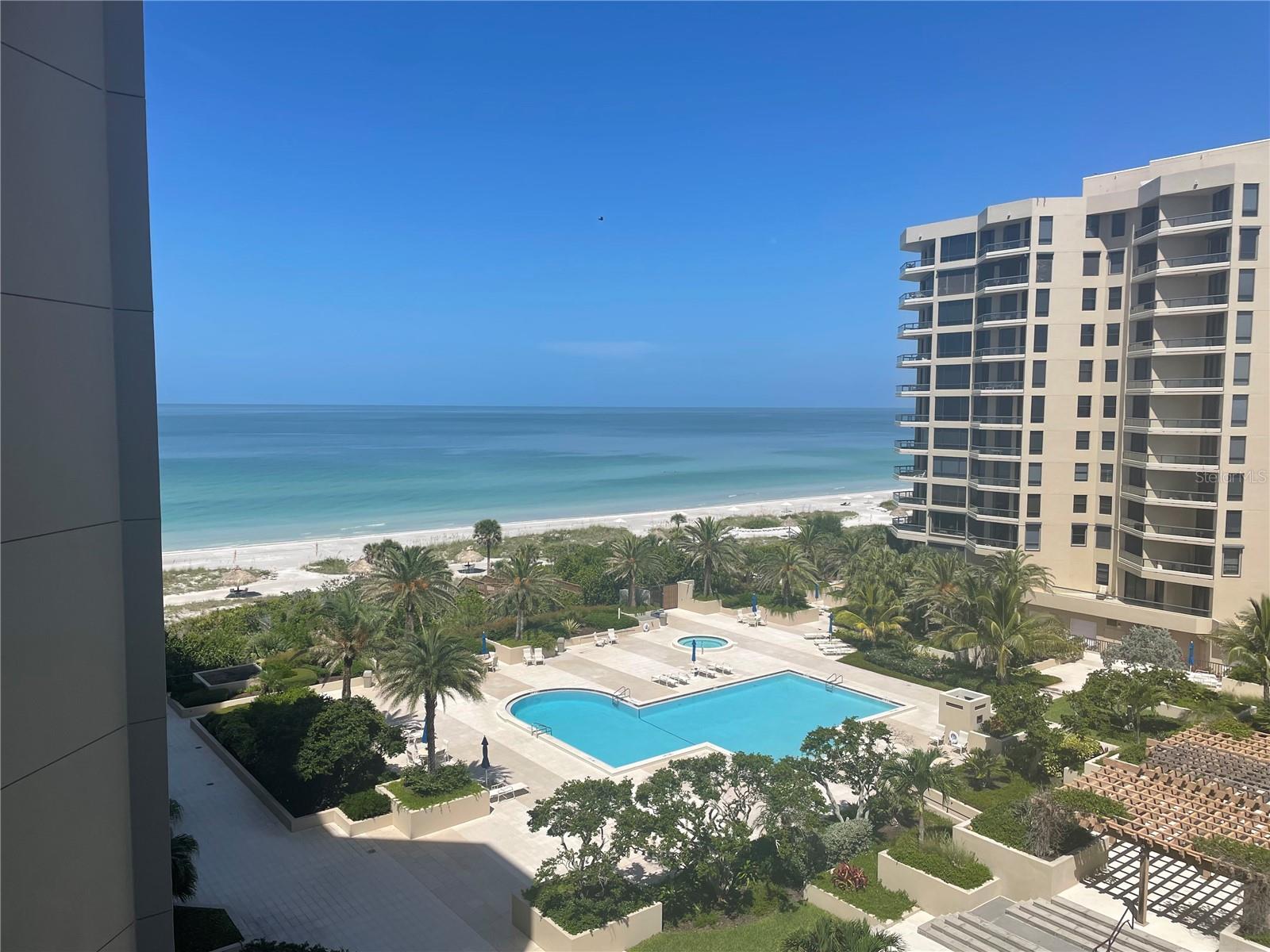 Welcome to your beachfront retreat on spectacular Longboat Key, Florida. The owners spared no expense to design and equip their home with the best of everything. This is the first time they've ever offered it for lease; it is available as early as August 1, 2025 thru December (3,4 or 5 month occupancy) and also available for the 4 months of January to April. This is 1600 sq ft of beautiful open concept living has beautiful water views from every room and comfortable living zones for TV, dining, music, reading and a spectacular bar area ideal for entertaining your friends and family. The balcony overlooks the blue waters of the Gulf of Mexico and is a perfect place for morning coffee or a late night supper. The primary bedroom is equipped with king size bed, large walk in closet and delivers a lovely Gulf view or total privacy depending on your mood. The elegant private bath has 2 sinks, lots of storage, a walk in shower, private toilet and bidet. Guest bedroom has spacious closet and queen size bed. There is a full-size laundry just outside the guest bedroom and full bath with shower. The Promenade is well known as a jewel among beachfront communities. With outstanding amenities (pool, jacuzzi, tennis, fitness, entertaining space, library, BBQ area and of course beach access) you'll appreciate the underground parking available for you and your guests. The property is just 5 minutes from a full service Publix store, drug store, restaurants and other services. Add 5 more minutes to visit St Armand's Circle and 5 minutes more to downtown Sarasota. Reach out to the listing agent for more details and the rental application, rules and regs as well as in-person or virtual tour of the property. (Virtual tour with 24 hour notice please.)