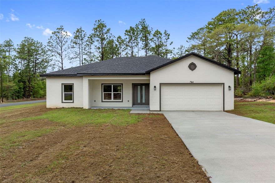 WOW come see this stunning new construction home in Dunnellon located in the desirable Citrus Springs area offering modern design comfort and privacy this beautiful 3 bedroom 2 bathroom home features an open concept layout with high ceilings and abundant natural light a gorgeous kitchen with a large center island quartz countertops and stainless steel appliances perfect for entertaining and everyday living the spacious primary suite includes a walk in closet and a well appointed bathroom designed for relaxation enjoy outdoor living with a covered lanai and a generous backyard with plenty of space to build a pool or create your dream outdoor oasis surrounded by nature with no rear neighbors this property offers peace and privacy while still being conveniently located near shopping dining schools and the famous Rainbow Springs and Withlacoochee River ideal for kayaking boating and outdoor activities no HOA making it perfect for homeowners and investors alike whether you are looking for a primary residence vacation home or rental investment this property is a fantastic opportunity schedule your private showing today and experience the best of Florida living