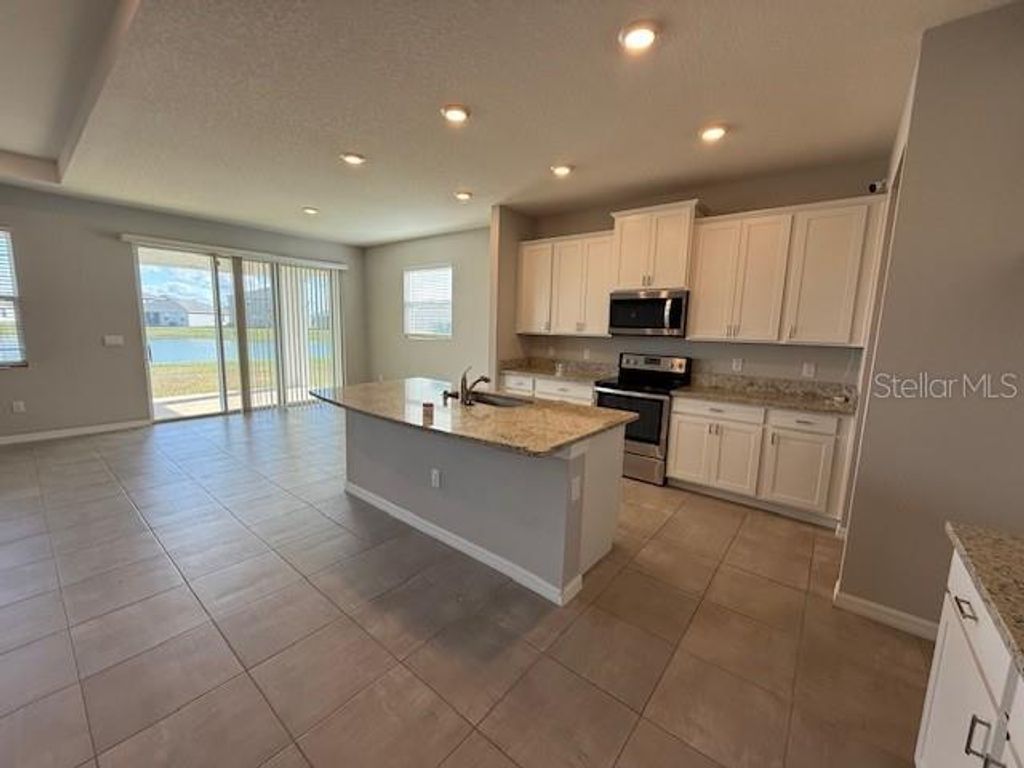 Photo of 5644 Flagstone Trail, Palmetto, FL 34221 (MLS # W7882068)