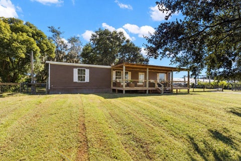 Photo of 10127 George Smith Road, Lithia, FL 33547 (MLS # TB8561394)