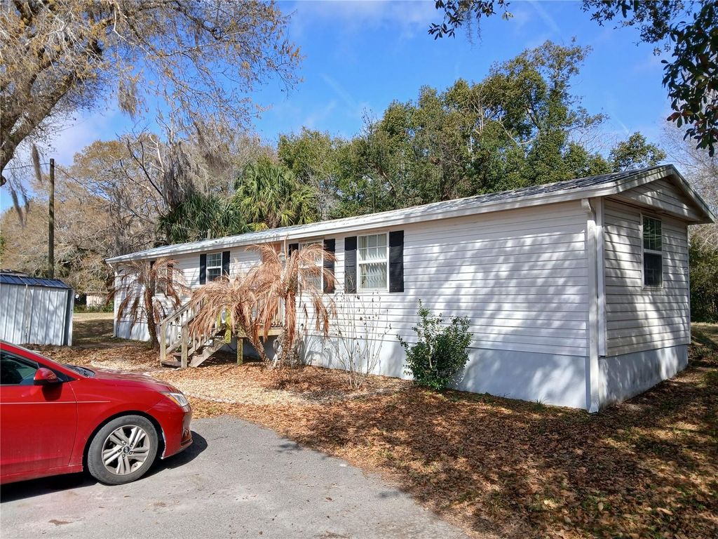 Photo of 10429 E Victory Lane, Inverness, FL 34450 (MLS # OM719780)