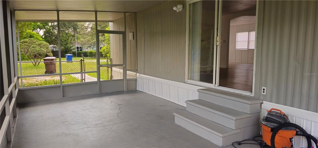 Photo of 221 Sunshine Boulevard, Polk City, FL 33868 (MLS # O6369712)