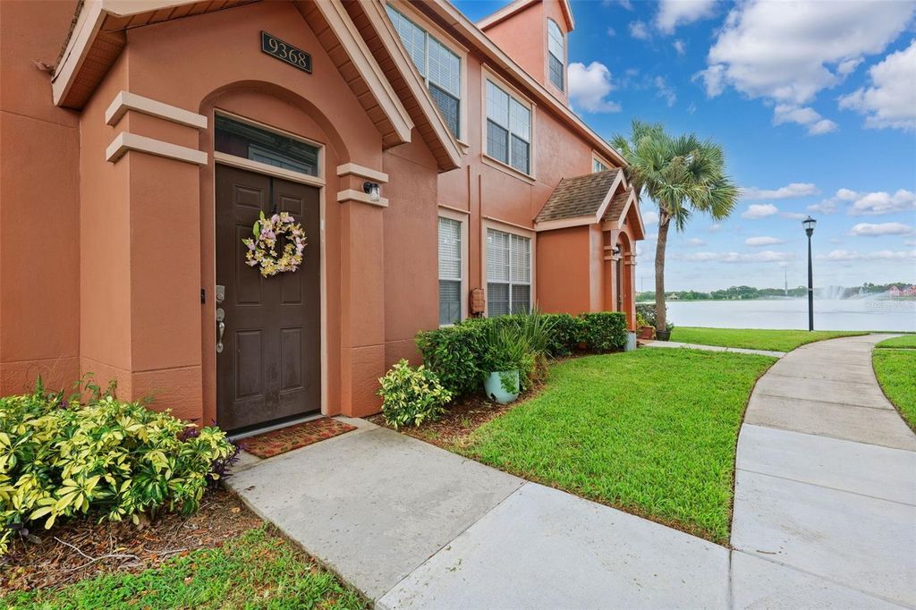 Photo of 9368 Lake Chase Island Way #9368, Tampa, FL 33626 (MLS # TB8416240)