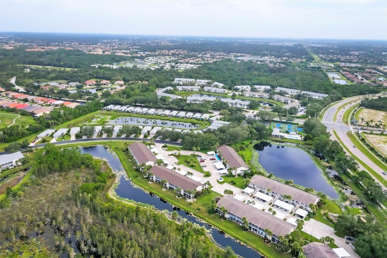 Welcome to this bright and peaceful 2-bedroom, 2-bathroom condo with private water view in the heart of Venice, Florida. Located on the second floor of the well-established Waterside Village community, this home offers a serene setting with everyday convenience and low HOA fees.
Step inside to find ceramic tile flooring throughout, a spacious primary suite with a large walk-in closet, and sparkling sliders that lead to an oversized screened lanai overlooking a tranquil nature preserve perfect for bird watching and morning coffee. The living room features vaulted ceilings and an open space flooded with natural light. Neutral interior tones provide a blank canvas for your personal coastal style.
The kitchen includes a breakfast bar and cozy dining nook, all bathed in sunlight. A carport and private storage shed on the main level offer simple convenience, and many other costs are included in the low HOA fee such as water, trash, pest control, basic cable, and much more. Plus, enjoy access to all the community has to offer with tennis courts, club house, heated pool, outdoor grills, bocce ball, and shuffleboard. Experience the best of Florida living in a quiet, central location just 15 minutes from Gulf beaches, and 10 minutes to historic downtown Venice shopping and dining.