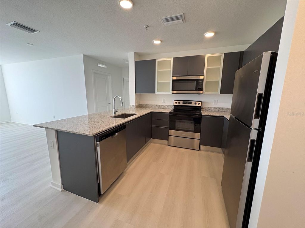 Photo of 5587 Millenia Park Blvd #524, Orlando, FL 32839 (MLS # O6384733)